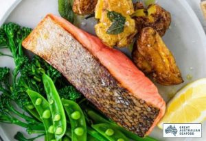 Crisy skin salmon served with smashed potatoes, snow peas and broccoli