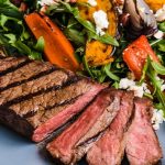 Porterhouse steak with a roast vegetable salad