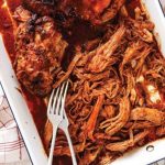 Slow cooker pulled pork in baking dish